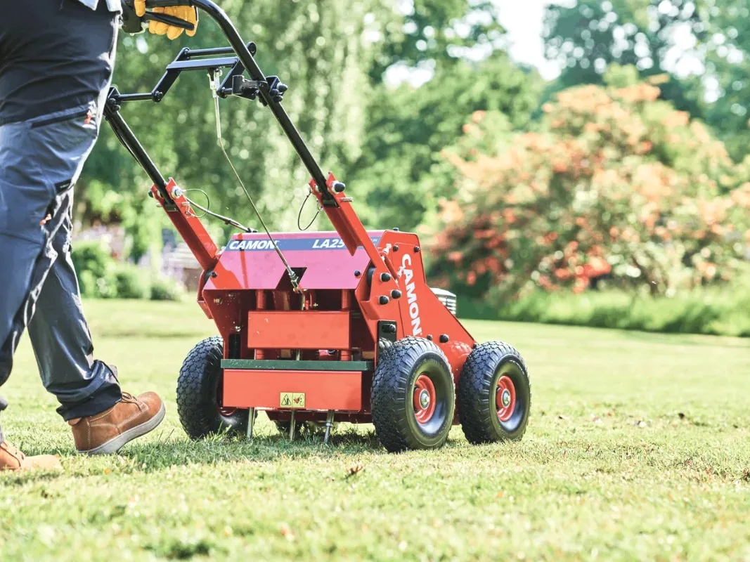 Aerating a lawn with a Camon LA25